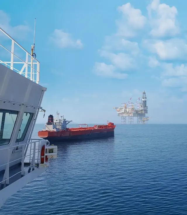 Shuttle tanker near an offshore installation under a clear sky